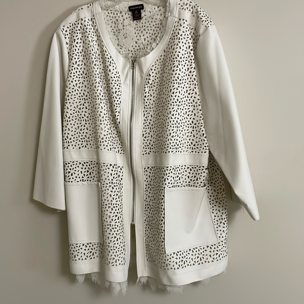 Cream colored jacket size 3x. 32” long.